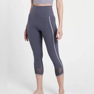 Athleta Salutation Stash Pocket II Intention Capri Leggings in Medieval Violet